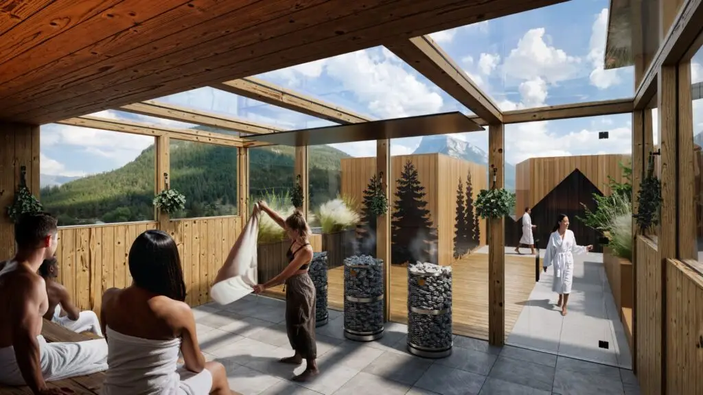 People relaxing in a modern Banff spa with mountain views