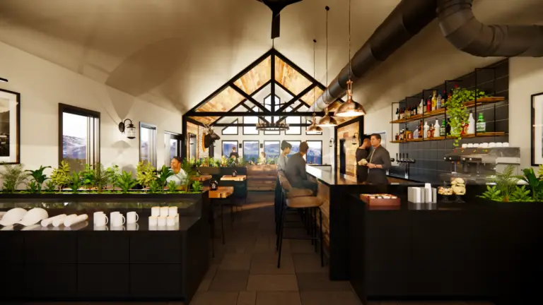 Modern restaurant interior with bar, seating, and plants.