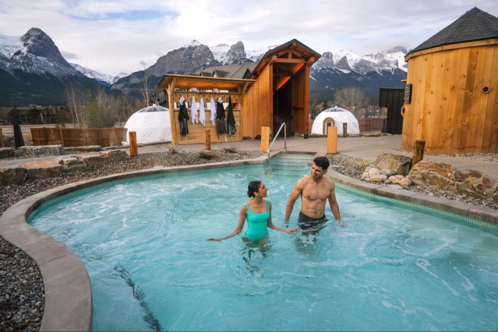 Couple in Hot Pool at Everwild Canmore