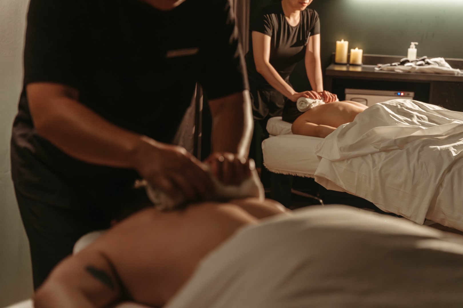 Massage therapists giving a massage at Everwild Canmore
